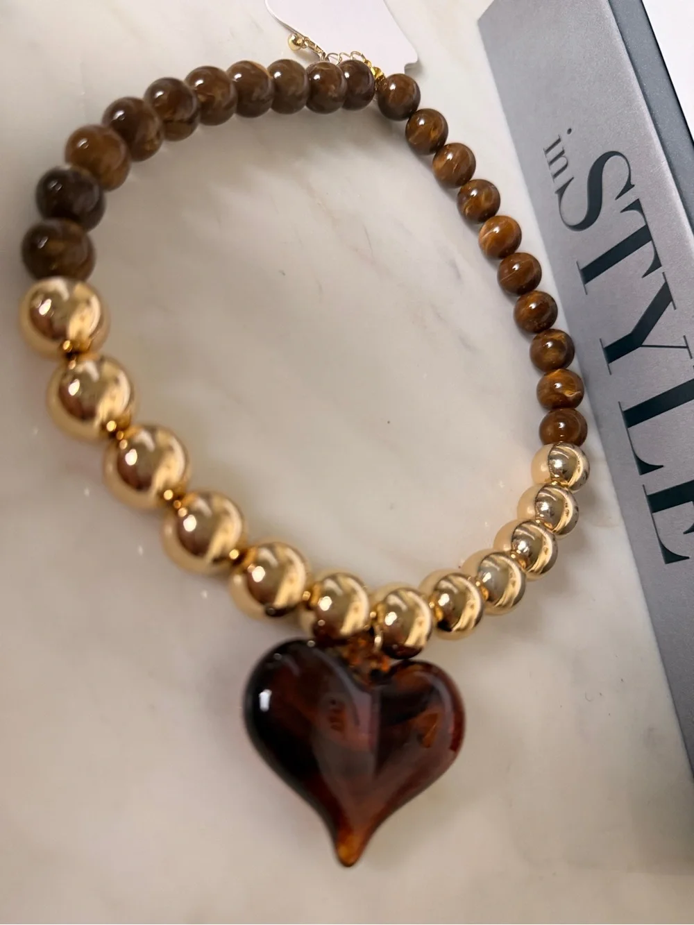 Gold Beaded Necklace with Brown Heart Pendant